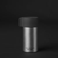 Back of canister on black background