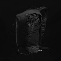 3/4 view of backpack on black background