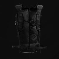 Back view of backpack on black background