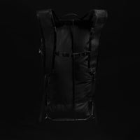 Back view of backpack on black background