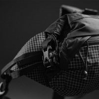 Close up view of roll top buckle