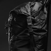 Side view of backpack roll top buckle