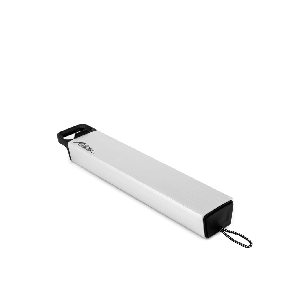 Angled shot of pill canister on white background