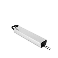 Angled shot of pill canister on white background