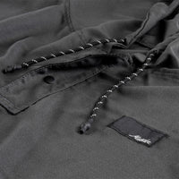 Close up view of charcoal poncho details including hood pull stings and snap button collar