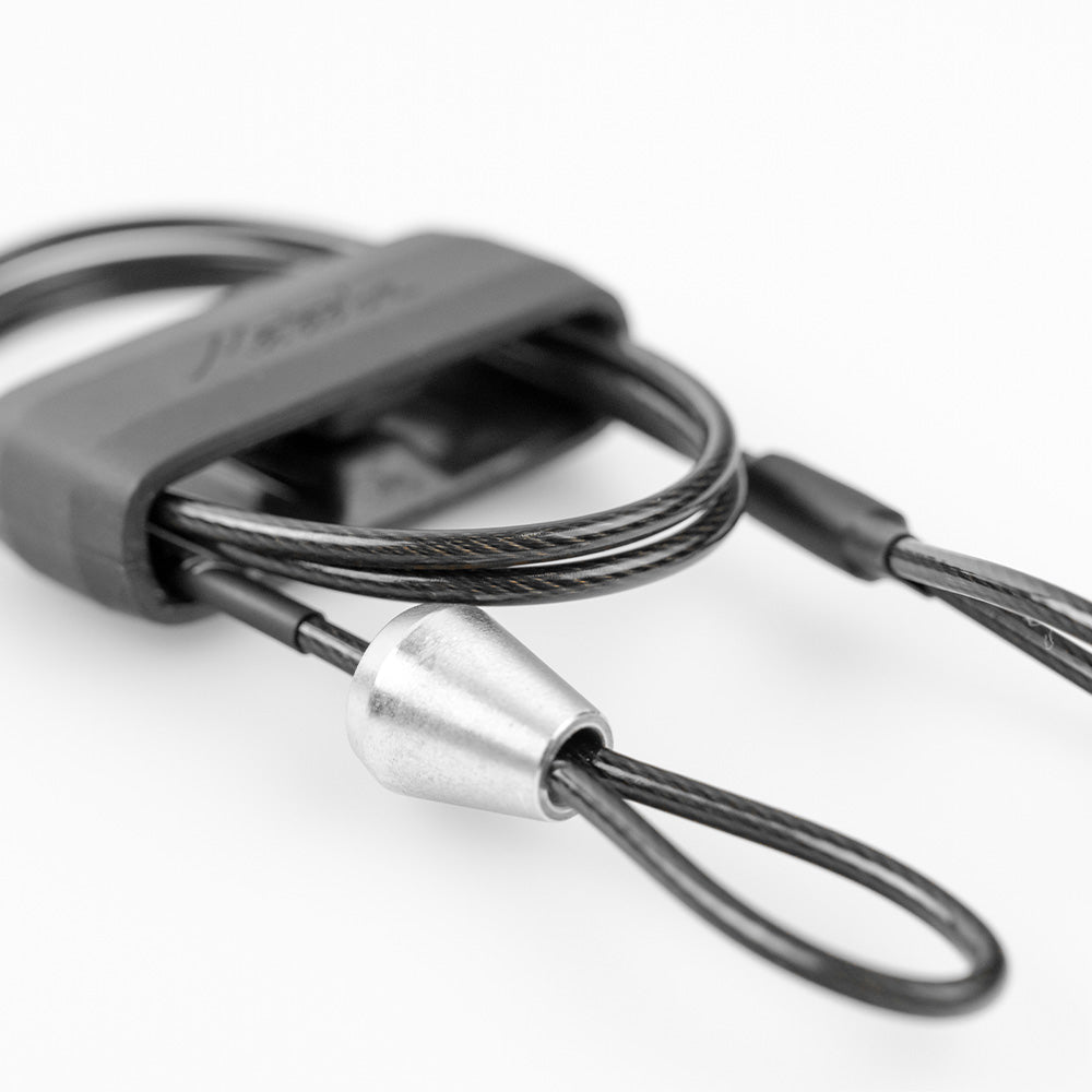 close up view or locking nut on accessory cable on white background